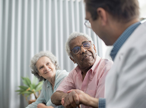 doctor with senior patients